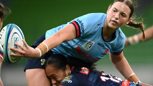 MELBOURNE, AUSTRALIA - APRIL 21: Caitlyn Halse of the Waratahs passes the ball during the Super W match between Melbourne Rebels Women and NSW Waratahs Women at AAMI Park, on April 21, 2023, in Melbourne, Australia. (Photo by Quinn Rooney/Getty Images)