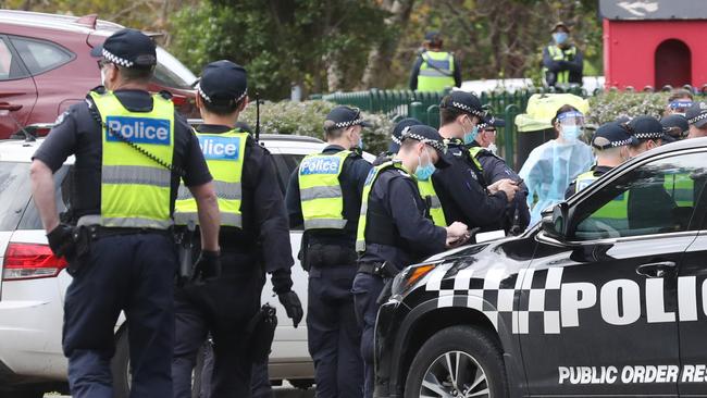 The public order response team is among the 500 police officers guarding the towers. Picture: David Crosling