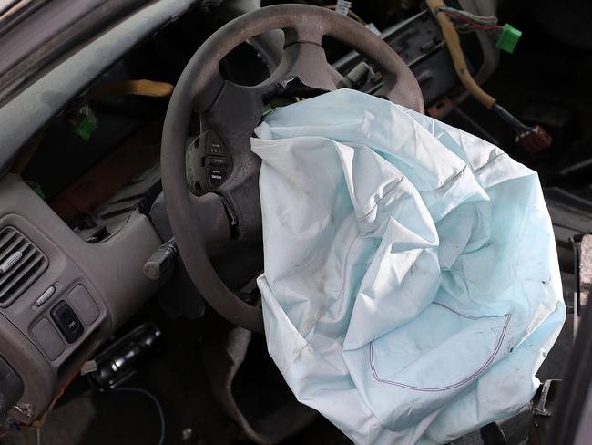 A deployed Takata Corp airbag in a 2001 Honda Accord. Picture: Joe Raedle/Getty