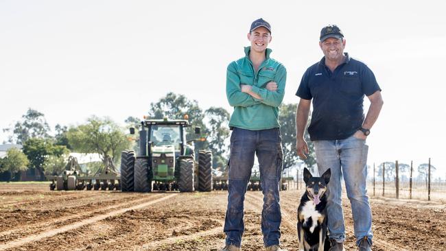 Ploughing on: Grain grower Darren Trewick, right, with son Jack at their Elmore farm. The family business is continuing with its barley crop, with high hopes that other Asian countries will pick up crop China might otherwise have bought. Picture: ZOE PHILLIPS