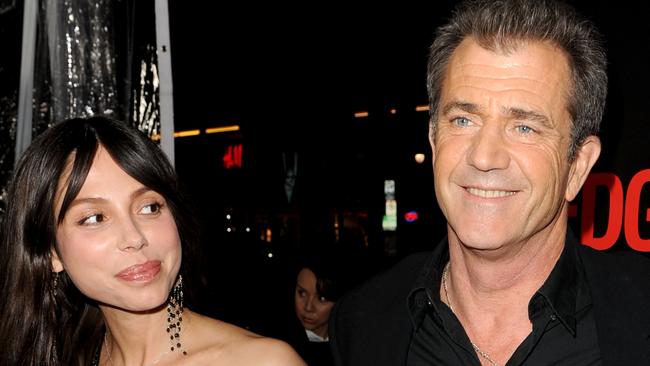 Mel Gibson and Oksana Grigorieva arrive at the premiere of Edge of Darkness at Grauman's Chinese Theatre in 2010.