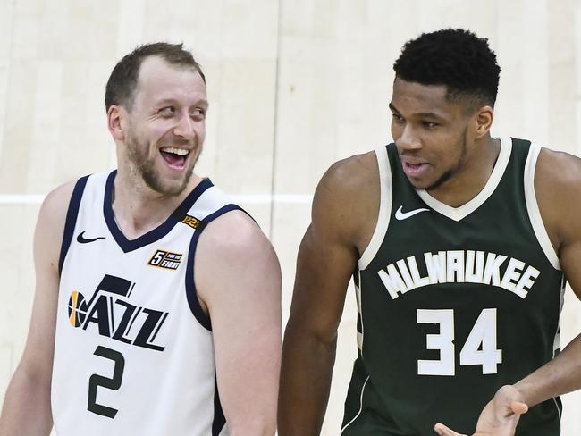 SALT LAKE CITY, UTAH - FEBRUARY 12: Joe Ingles #2 of the Utah Jazz jokes with Giannis Antetokounmpo #34 of the Milwaukee Bucks during a game at Vivint Smart Home Arena on February 12, 2021 in Salt Lake City, Utah. NOTE TO USER: User expressly acknowledges and agrees that, by downloading and/or using this photograph, user is consenting to the terms and conditions of the Getty Images License Agreement. (Photo by Alex Goodlett/Getty Images)