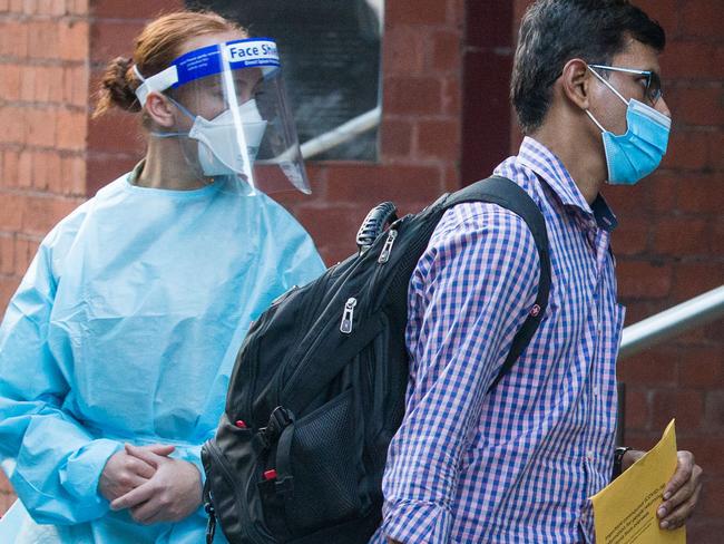 MELBOURNE, AUSTRALIA - NewsWire Photos APRIL 8, 2021: International travellers arrived at the Intercontinental Hotel in Melbourne to complete 2 weeks of quarantine. Victoria's quarantine program resumed today. Picture: NCA NewsWire / Paul Jeffers