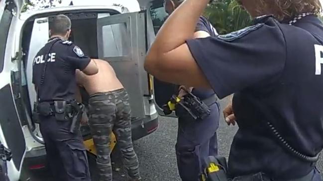Cairns Child Protection and Investigation Unit (CPIU) detectives arrest a man during Operation Uniform Kalahari. Picture: Queensland Police