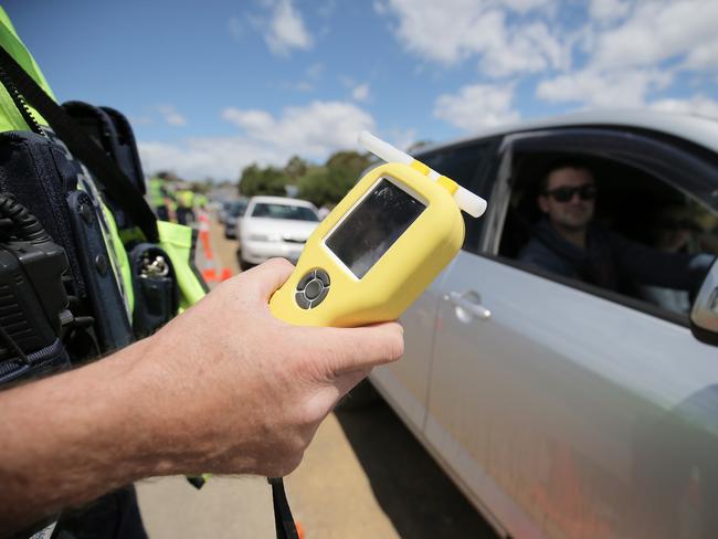 Road Safety Advisory Council chair Jim Cox and Police Commissioner Darren Hine urge motorists to drive safely over the festive season. (RBT, DUI driving under the influence, Randon Breath Testing, police, alcohol, drugs drink driving) Picture: RICHARD JUPE