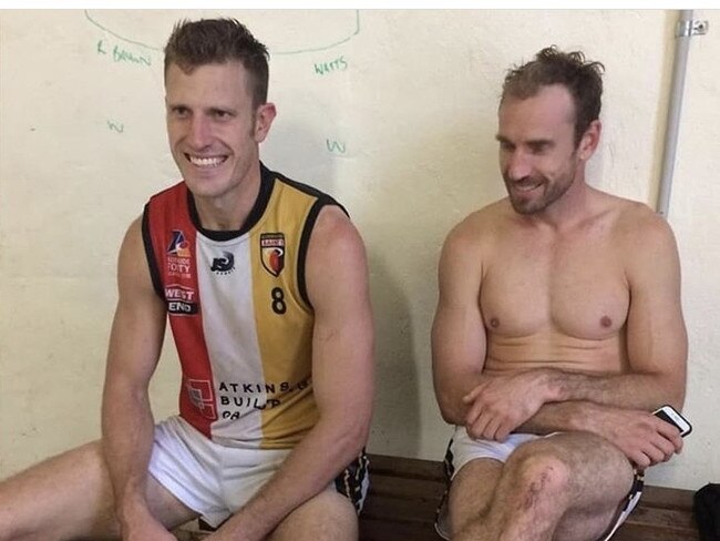 Brothers Travis and Shane Tuck after playing an amateur game of football in Adelaide.