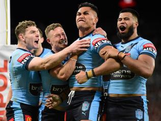 TOWNSVILLE, AUSTRALIA - JUNE 09: Daniel Saifiti of the Blues celebrates after scoring a try  during game one of the 2021 State of Origin series between the New South Wales Blues and the Queensland Maroons at Queensland Country Bank Stadium on June 09, 2021 in Townsville, Australia. (Photo by Ian Hitchcock/Getty Images)