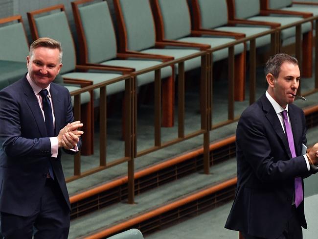 Shadow Minister for Health Chris Bowen (left) and Shadow Treasurer Jim Chalmers sanitise ahead of the ministerial statement. Picture: Getty Images