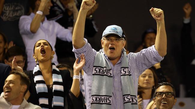 Prime Minister Scott Morrison celebrating as his team the Cronulla Sharks make a comeback to beat the Penrith Panthers at PointsBet Stadium. Picture: Jonathan Ng