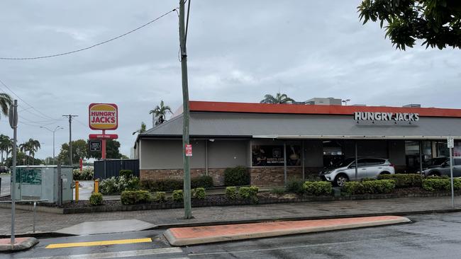 A man turned to the Hungry Jacks store on Peel St in Mackay on Saturday night after he was allegedly seriously injured in a weapon attack. Photo: Fergus Gregg