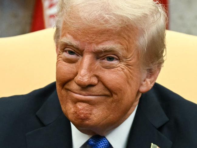 US President Donald Trump looks on during a meeting with Japanese Prime Minister Shigeru Ishiba in the Oval Office of the White House in Washington, DC, on February 7, 2025. (Photo by Jim WATSON / AFP) / ALTERNATE CROP