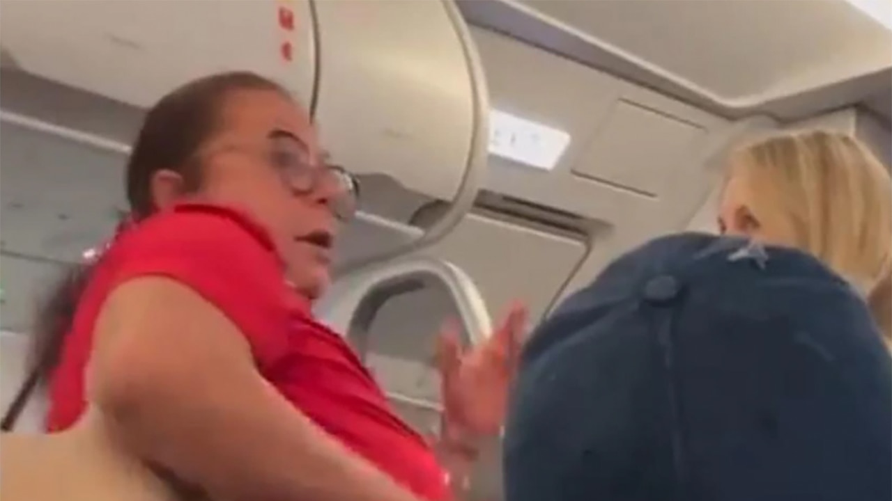 I gotta go pee!': Woman pulls pants down in aisle during Florida flight,  video shows