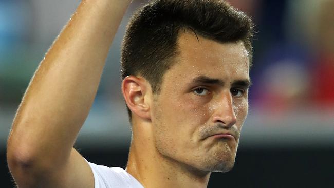 Bernard Tomic celebrates winning his second round match against Victor Estrella Burgos of The Dominican Republic on day three of the 2017 Australian Open earlier this year. (Photo by Cameron Spencer/Getty Images)