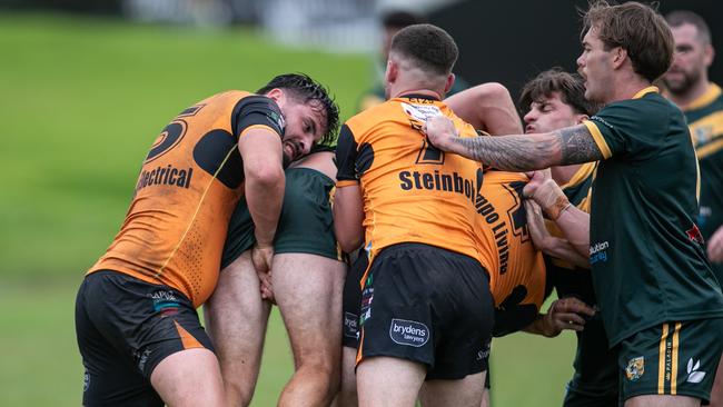 The Entrance’s defence muscling up. Picture: Julian Andrews