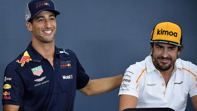 (From L) Scuderia Toro Rosso's French driver Pierre Gasly, Red Bull Racing's Australian driver Daniel Ricciardo and McLaren Honda's Spanish driver Fernando Alonso give a press conference during the Belgian Formula One Grand Prix at the Spa-Francorchamps circuit in Spa on August 23, 2018. (Photo by JOHN THYS / AFP)