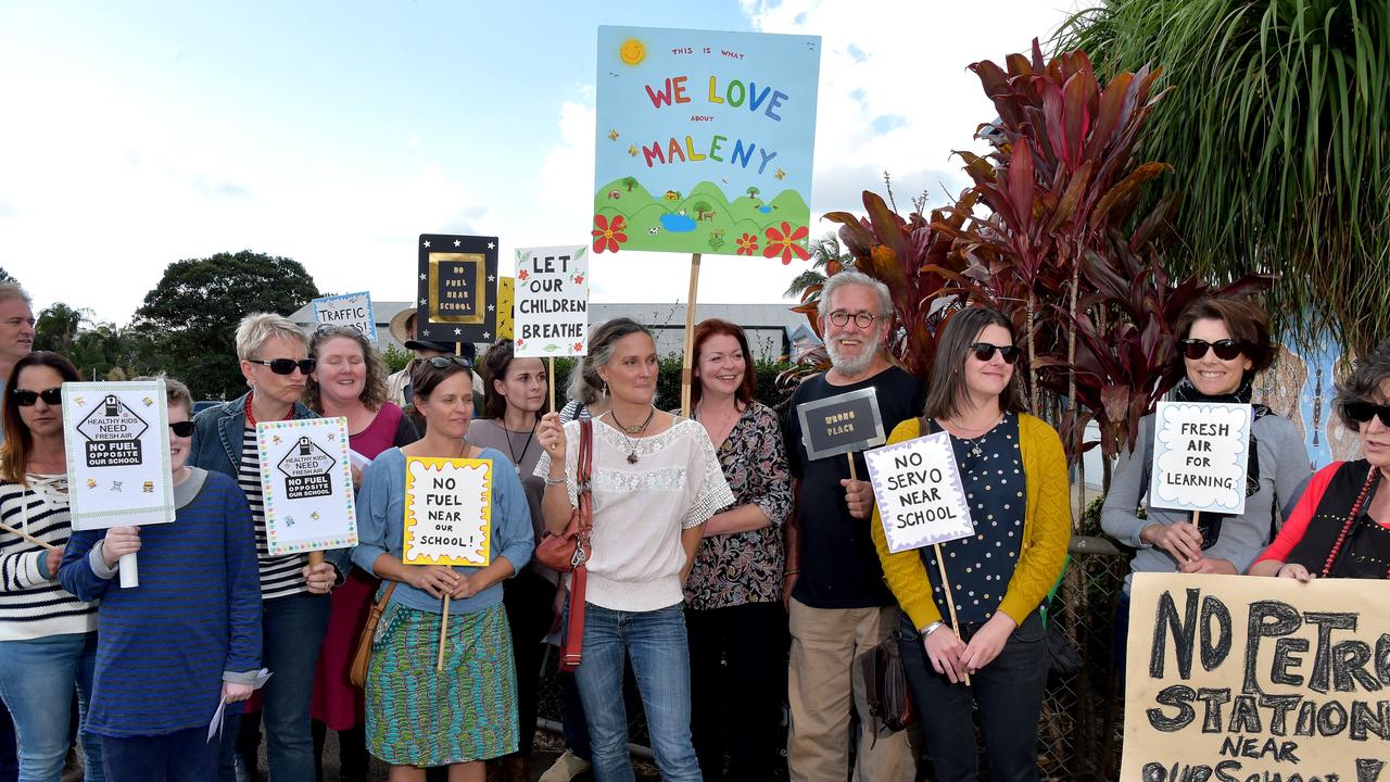 Members of the Maleny community gathered to protest the proposed service station opposite the local primary school.