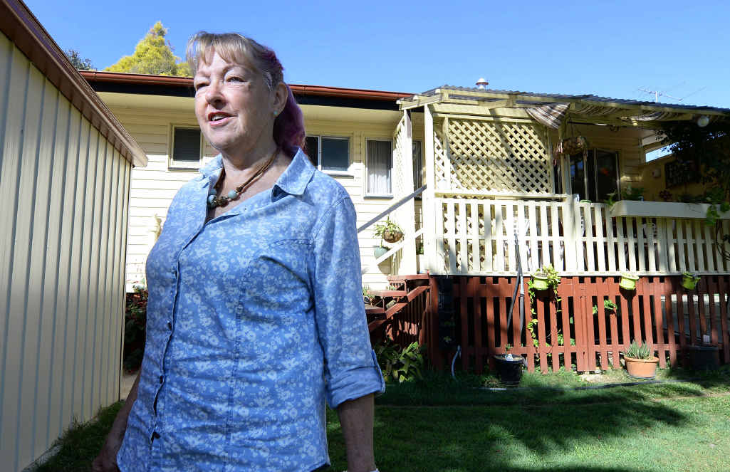 WHAT CAN I DO?: Tivoli resident Pamela Lee is trying to sell her house that was inundated in 2011 but has had no interest from buyers. Picture: Rob Williams