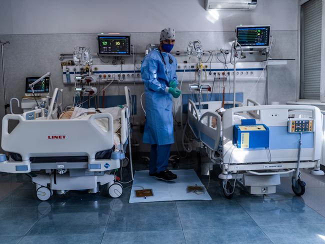 Doctor Dimitar Milutinov taking care of coronavirus patients in the intensive care unit of St. Anna Hospital, Bulgaria. Picture: Hristo Rusev/Getty Images