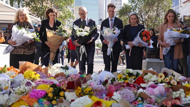 The Prime Minister and NSW Premier lay flowers at Bondi Junction. Picture: AFP