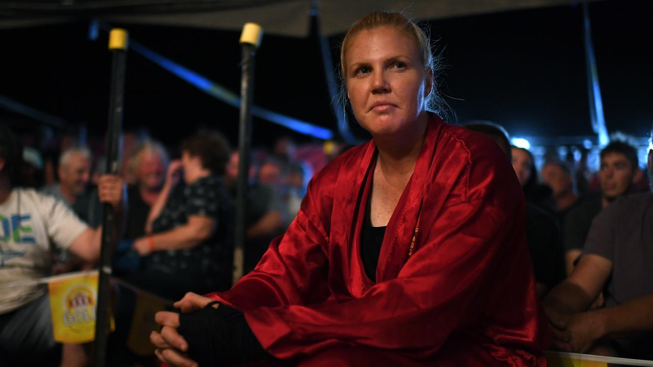 Boxer Michelle "Big Red" Stanford is seen before her fight the Fred Brophy's boxing Troupe in Birdsville in 2019. AAP Image/Dan Peled