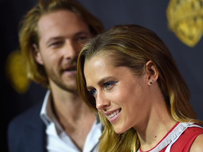 LAS VEGAS, NV - APRIL 21: Actors Luke Bracey and Teresa Palmer attend Warner Bros. Pictures Invites You to Â“The Big PictureÂ”, an Exclusive Presentation Highlighting the Summer of 2015 and Beyond at The Colosseum at Caesars Palace during CinemaCon, the official convention of the National Association of Theatre Owners, on April 21, 2015 in Las Vegas, Nevada. (Photo by Michael Buckner/Getty Images for CinemaCon)