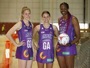 Queensland Firebirds netball players Kim Jenner (left), Tippah Dwan and Romelda Aiken during a tour of the new netball facility under construction in Brisbane. Picture: REGI VARGHESE