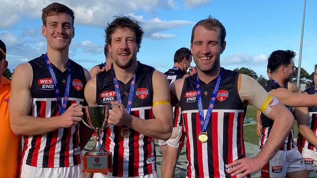 Todd Reid (left) with South Gambier playing-coach Brayden Kain and teammate James Prapotny. Picture: South Gambier Football Club