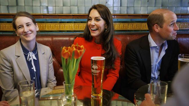 Prince William and Catherine, Princess of Wales chat to local business people as they visit the Dog and Duck pub in Soho. Picture: WPA Pool/Getty Images.