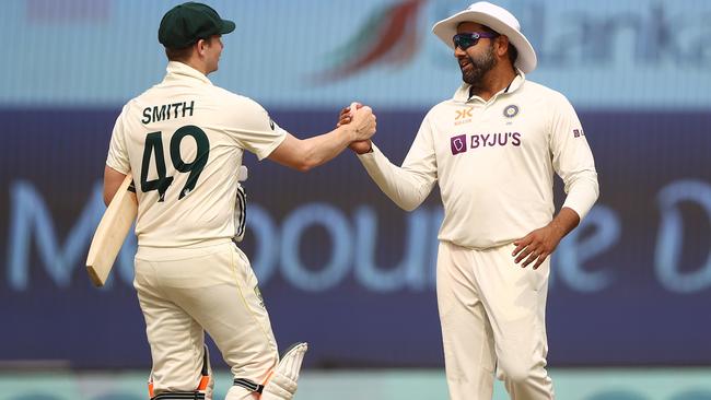 Stand-in captain Steve Smith and Rohit Sharma shake hands to signal the end of the final test with pettered out to a draw. Picture: Getty Images