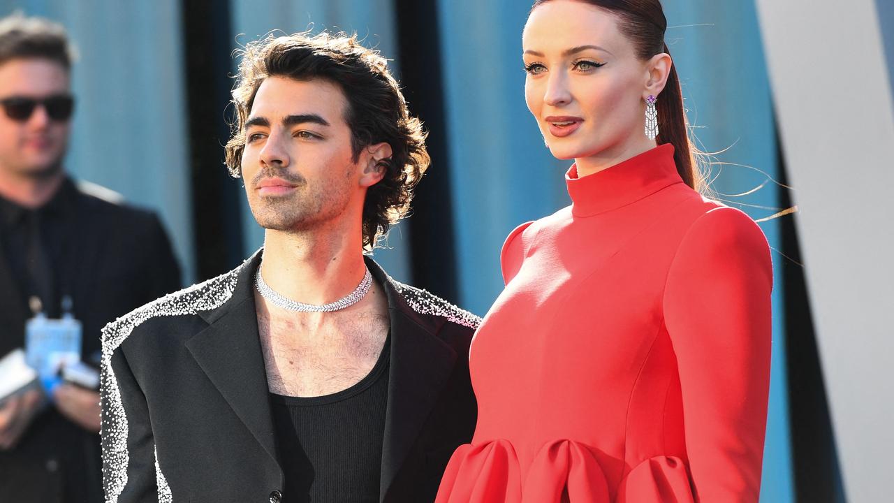 Joe Jonas and Sophie Turner attend the 2022 Vanity Fair Oscar Party. The couple have two daughters. (Photo by Patrick T. FALLON / AFP)