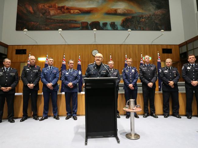 Victorian Chief Commissioner Ken Lay addresses a gathering of Australian And New Zealand Police Commissioners and MPs on the eve of White Ribbon Day, at Parliament House, Canberra.