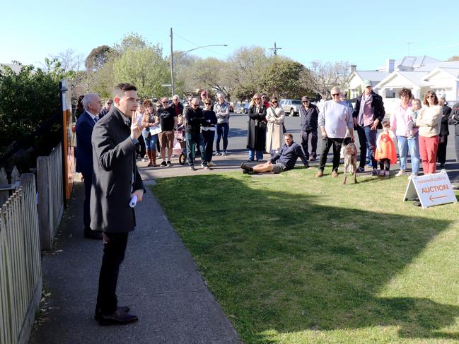 Shaun Carroll calls the auction at 289 Myers St, East Geelong. The house sold for $680,000.