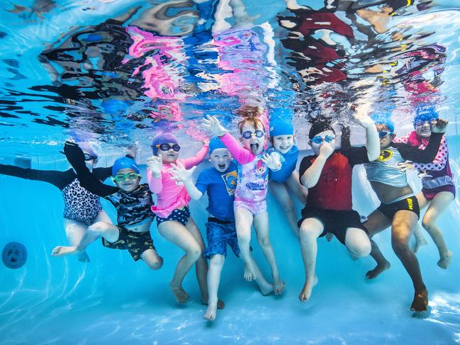 Earnshaw State College preps Mikayla Atkinson, Bianca Willis and Elenor Smith having fun in the pool in Term 4. Photo: Nigel Hallett