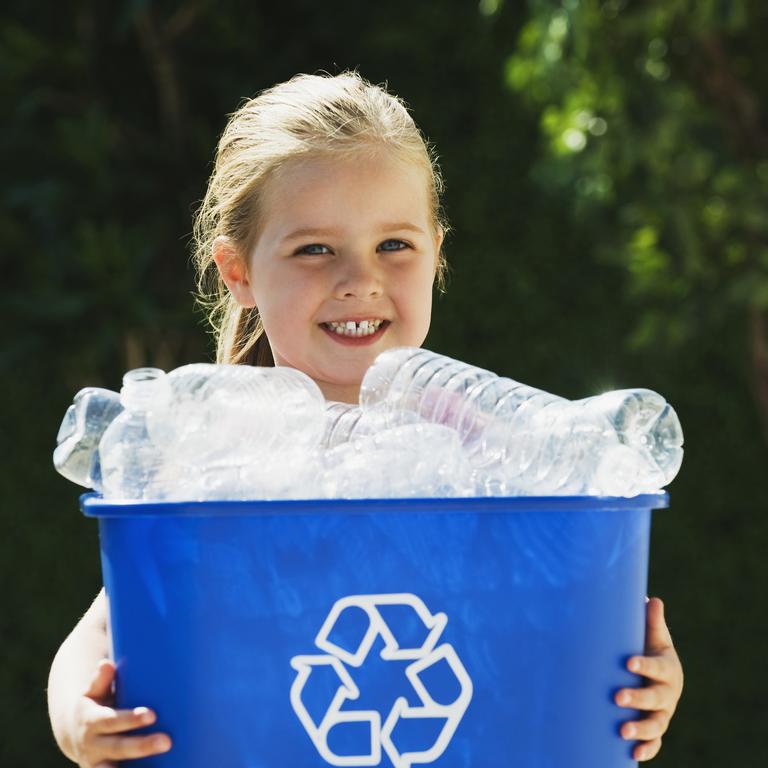 Little blond Girl Holding blue Recycling Bin