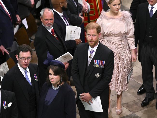 Prince Harry walks behind Princess Eugenie and Jack Brooksbank. Picture: Getty Images