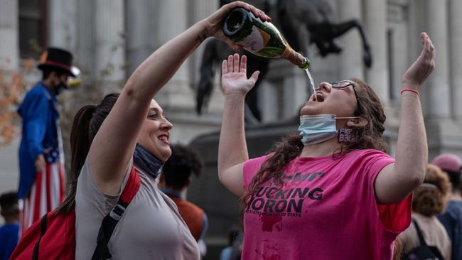 Joe Biden may avoid drinking but his supporters reached for the champagne in Philadelphia when he was declared winner of the presidential election over the weekend. Picture: Getty Images/AFP