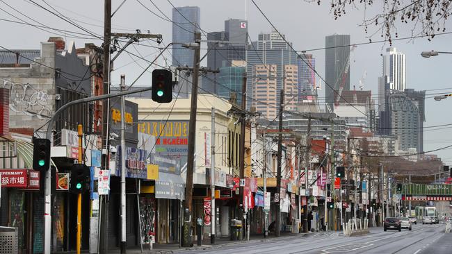 Closed shops are seen on Victoria Street in Richmond during stage four COVID-19 lockdown in Melbourne. Picture: NCA NewsWire/ David Crosling