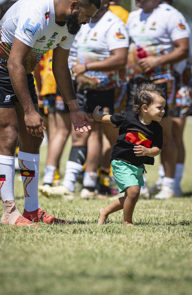 Jaydon Dos Adams Memorial player Tarun Schefe with his son Takai schefe after a game of the Warriors Reconciliation Carnival at Jack Martin Centre, Saturday, January 25, 2025. Picture: Kevin Farmer