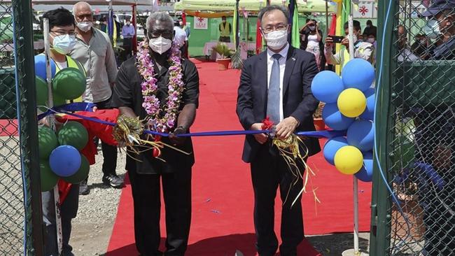 China's ambassador to the Solomon Islands Li Ming and Solomons Prime Minister Manasseh Sogavare open a China-funded national stadium complex in Honiara. Picture: Chinese Embassy of Solomon Islands