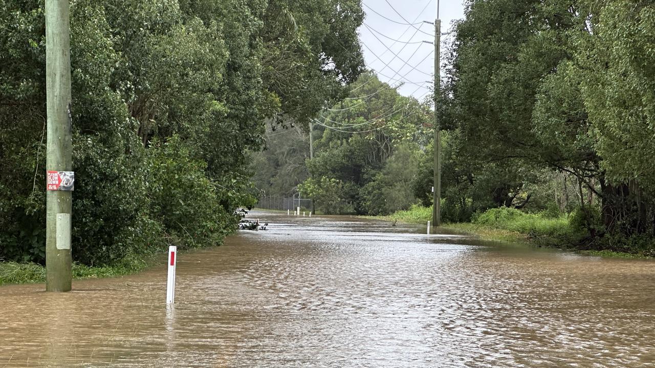 Tallebudgera Connection Road is underwater and impassable on the Gold Coast in the aftermath of Cyclone Alfred battering the Gold Coast overnight on March 8. Picture: Chantay Logan