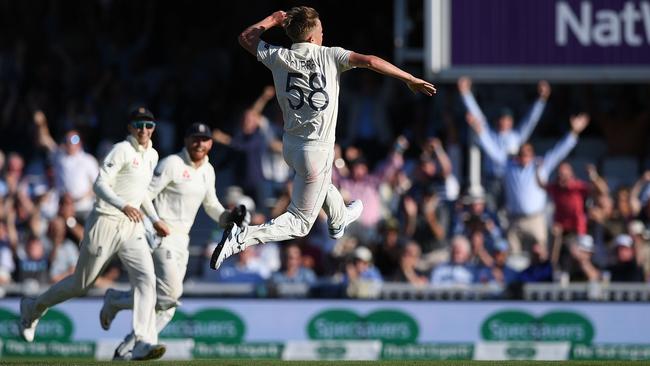 Sam Curran gets airborne after taking two wickets in two balls. Picture: AFP