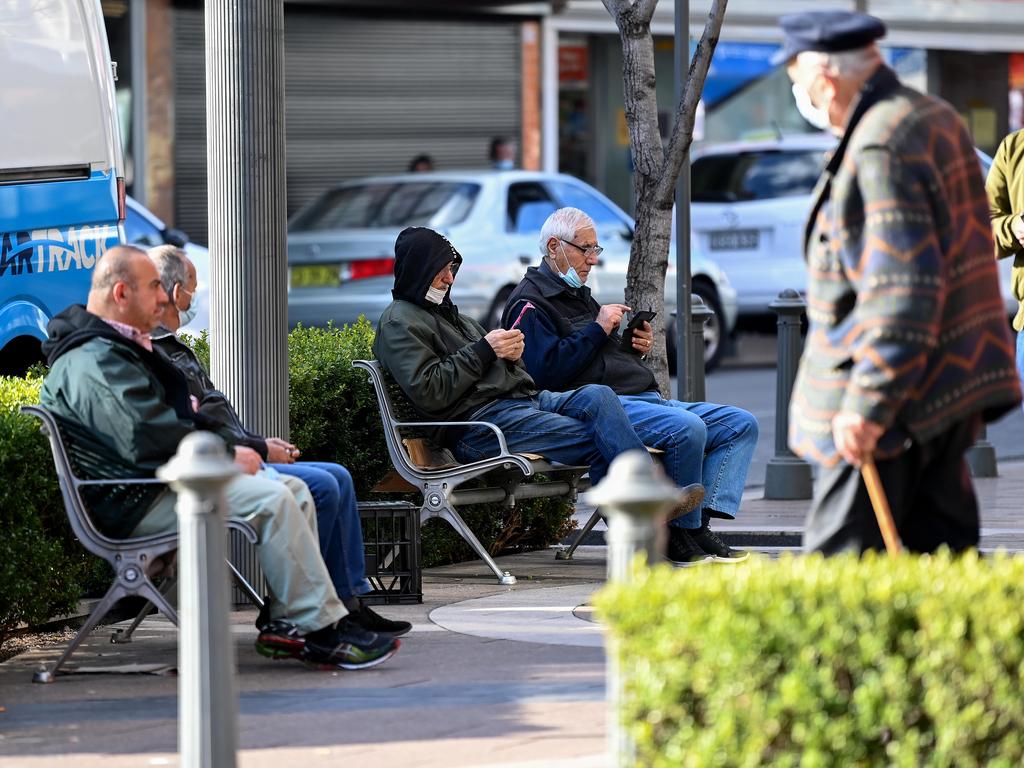 People not wearing face masks correctly near the main shopping strip in Fairfield. Picture: NCA NewsWire/Bianca De Marchi