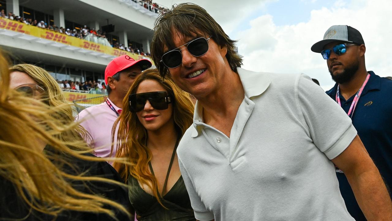 US actor Tom Cruise and Colombian singer Shakira attend the 2023 Miami Formula One Grand Prix in May. Photo by CHANDAN KHANNA / AFP.