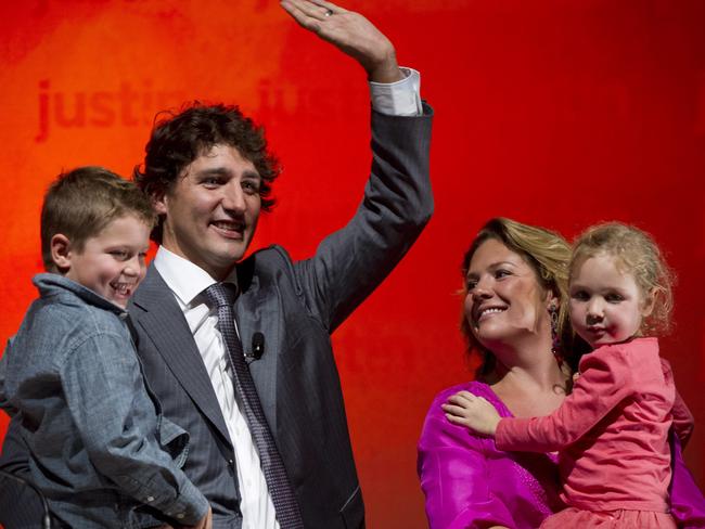 Justin Trudeau holds his son Xavier and his wife Sophie Gregoire Trudeau holds their daughter Ella-Grace in 2012. Picture: AP/The Canadian Press, Paul Chiasson