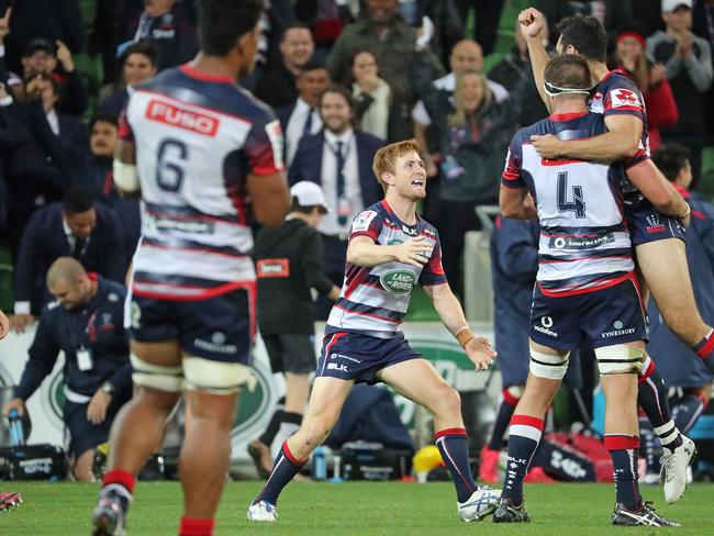 MELBOURNE, AUSTRALIA - APRIL 15:  Nic Stirzaker and Jack Debreczeni of the Rebels celebrate at the full time whistle as they win the round eight Super Rugby match between the Rebels and the Brumbies at AAMI Park on April 15, 2017 in Melbourne, Australia.  (Photo by Scott Barbour/Getty Images)