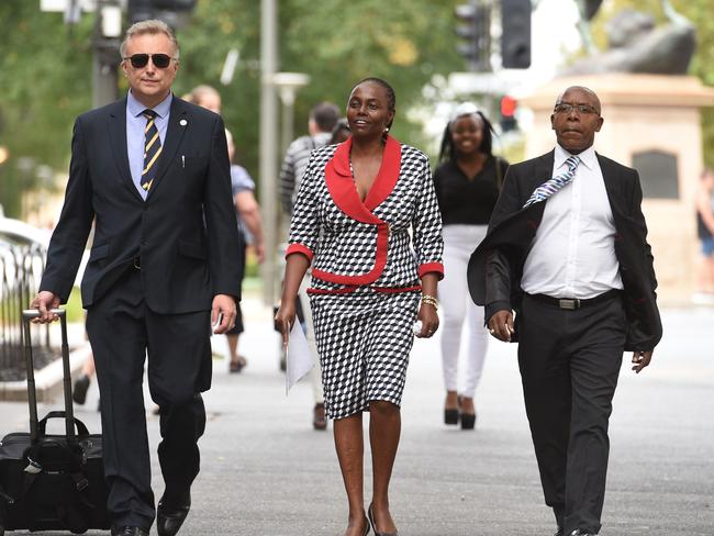 Senator Lucy Gichuhi leaving the conference with chief of staff Mark Mudri and her family. Picture Roger Wyman