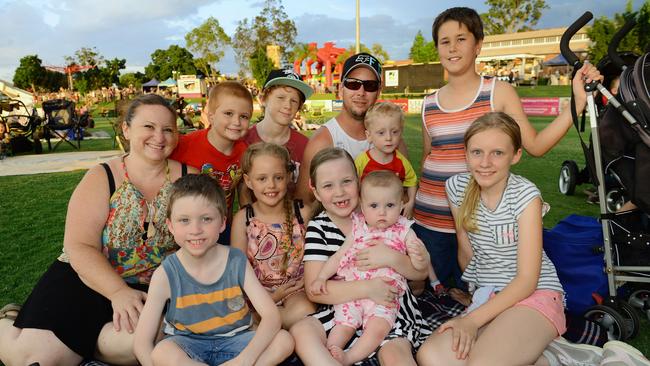 Ipswich residents rang in 2015 at North Ipswich Reserve. Front from left, Taylen, 6, Ella, 7, Serena, 8, Isabel, 8 months, Lily, 12, and rear from left, Shelly, Dean, 8, Walter, 13, Aaron, Bailey, 3, and Jordan, 12, all of Karalee. Picture: David Nielsen