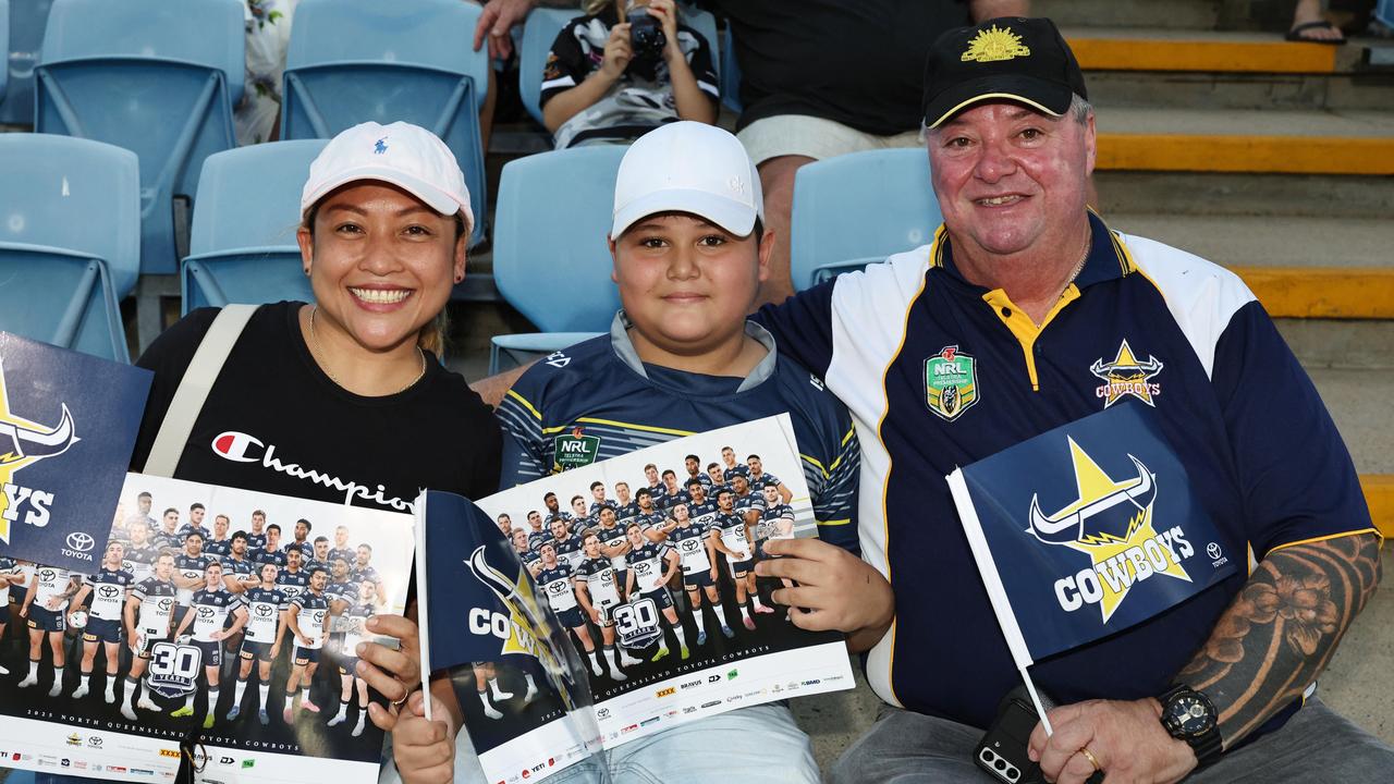 Jennefir Dowie, Christian Dowie, 10, and Don Dowie cheer on the Cowboys in the NRL preseason match between the North Queensland Cowboys and the Dolphins, held at Barlow Park. Picture: Brendan Radke