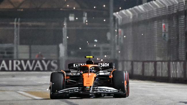 McLaren are flying once again. (Photo by ROSLAN RAHMAN / AFP)