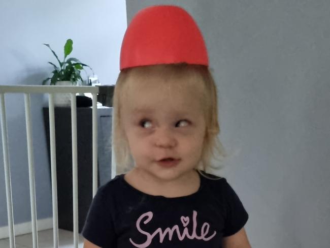 Molly (2) put a bowl of popcorn over her head for the 2nd time in 1/2 an hour, when told not to do it, she rolled her eyes, seen in photo. <b><a href="https://www.dailytelegraph.com.au/newslocal/blacktown-advocate/vote-help-us-find-the-cheekiest-toddler-in-nsw/news-story/9ae7eb32bd93be85a472b448d0c19dda">VOTE HERE </a></b>